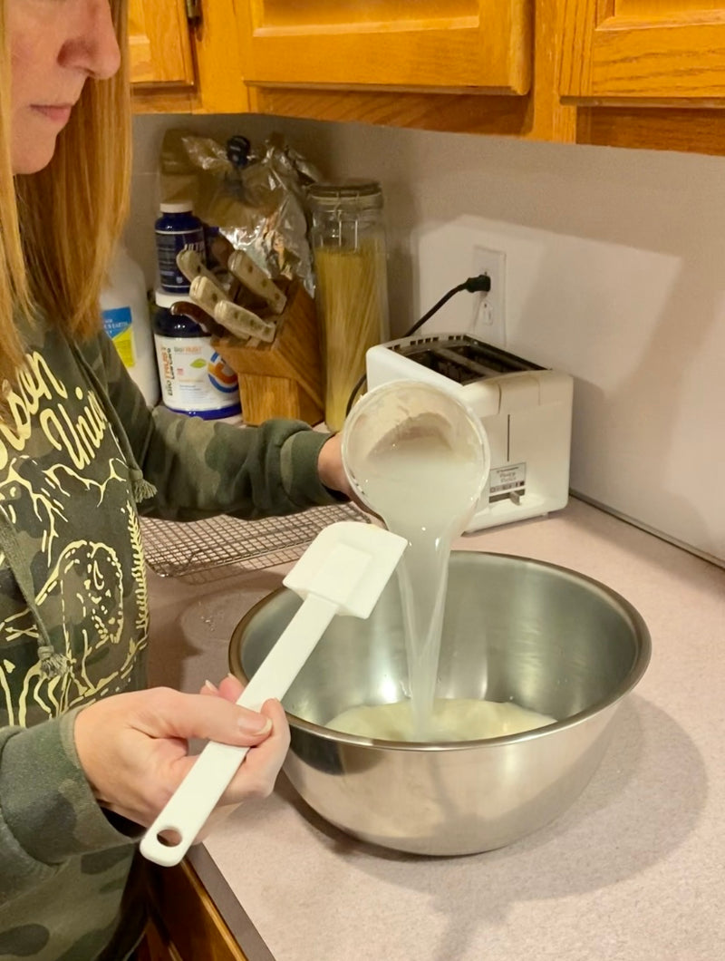 Adding water and flour to your starter